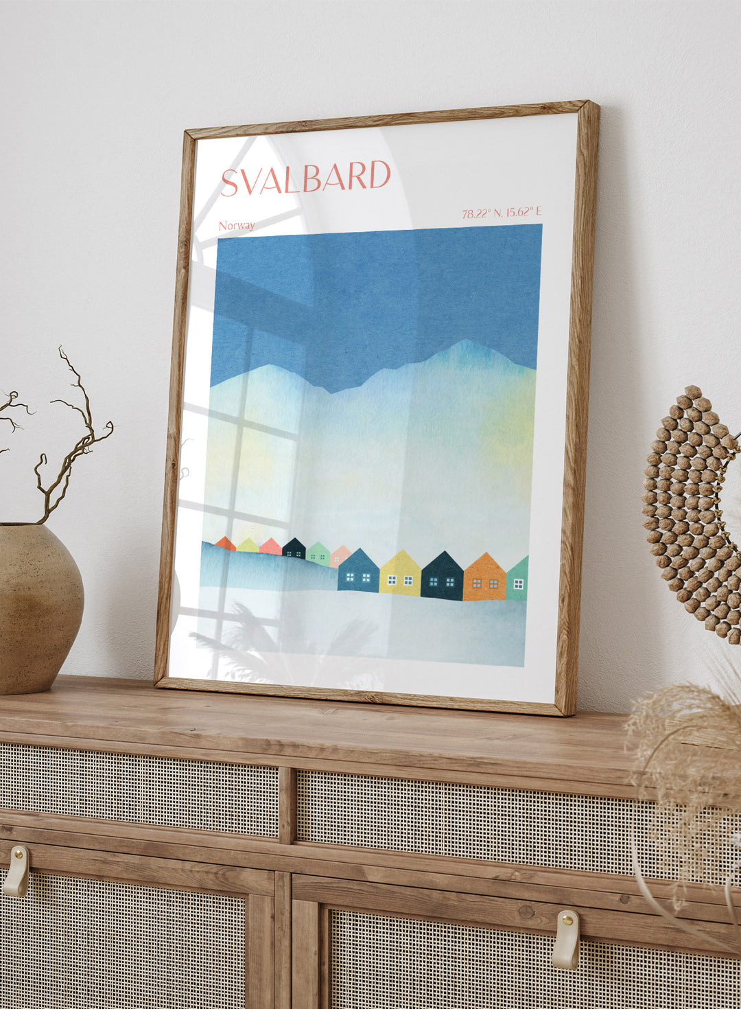 Poster of Svalbard with colorful houses and mountain landscape. Colorful Svalbard Winter Village by Longwayhome is a minimalist Scandinavian landscape art print featuring pastel houses, snowy mountains, and modern Nordic design.