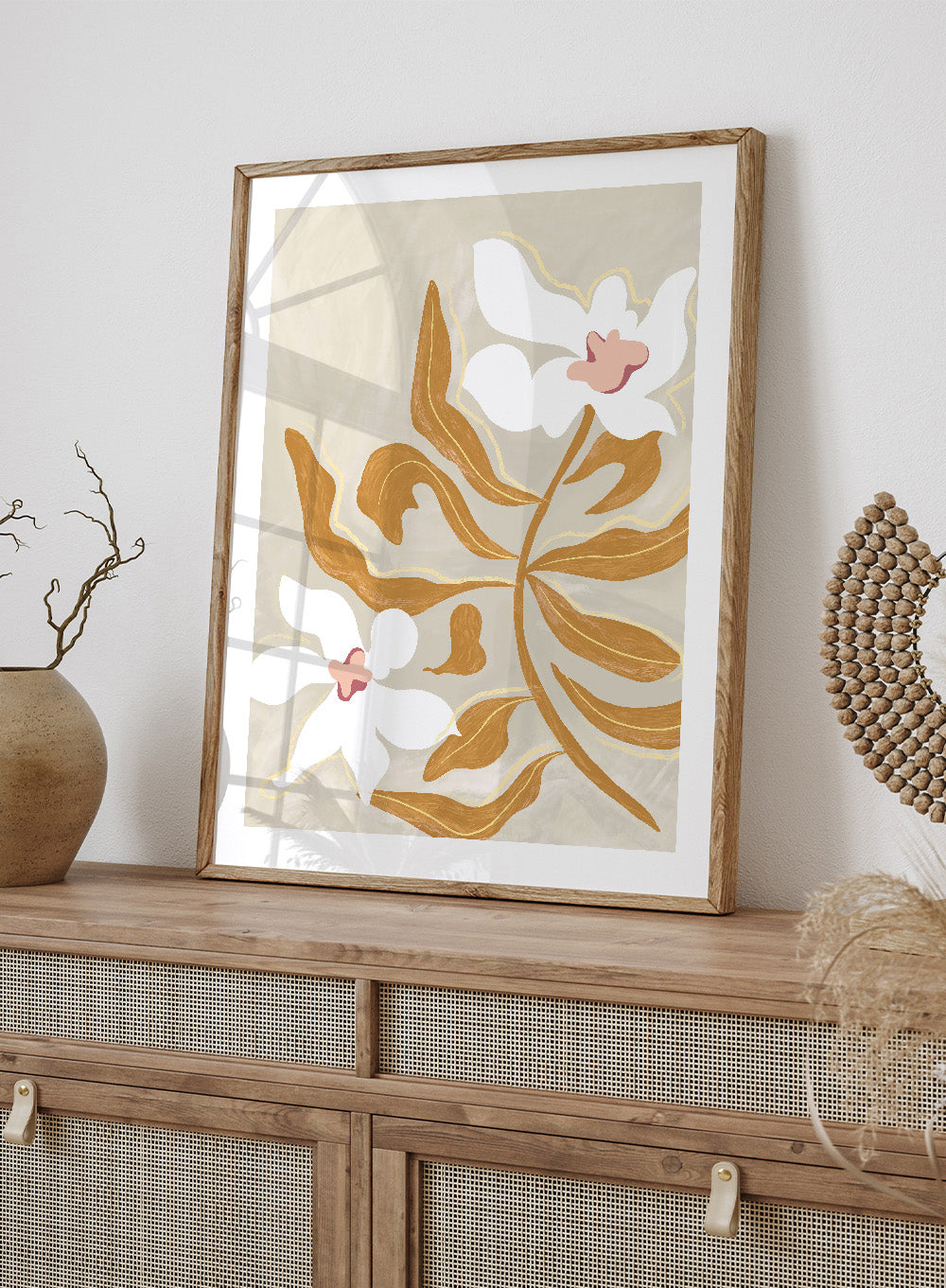 Decorative artwork with stylized flowers on a beige background. Flower Flower Flower by Arty Guava is a modern floral art print with oversized white blossoms and golden leaves. Officially licensed wall poster.