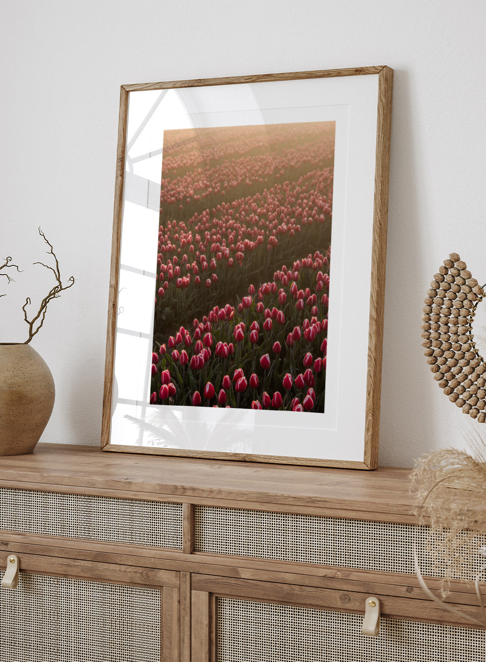 Field of pink tulips with a soft glow, likely from sunset or sunrise. Field of Flowers Art Print by Mareike Böhmer. Floral wall art photography featuring pink tulips. Officially licensed fine art print by German photographer Mareike Böhmer.