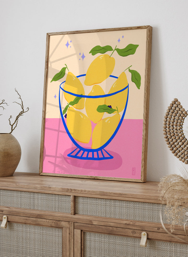 Illustration of lemons in a glass bowl with green leaves on a pink and beige background. Blue Floral Arrangement by Dirkie Nell is a botanical floral art print featuring deep blue flowers, folk inspired illustration, modern wall art, and expressive hand painted details.