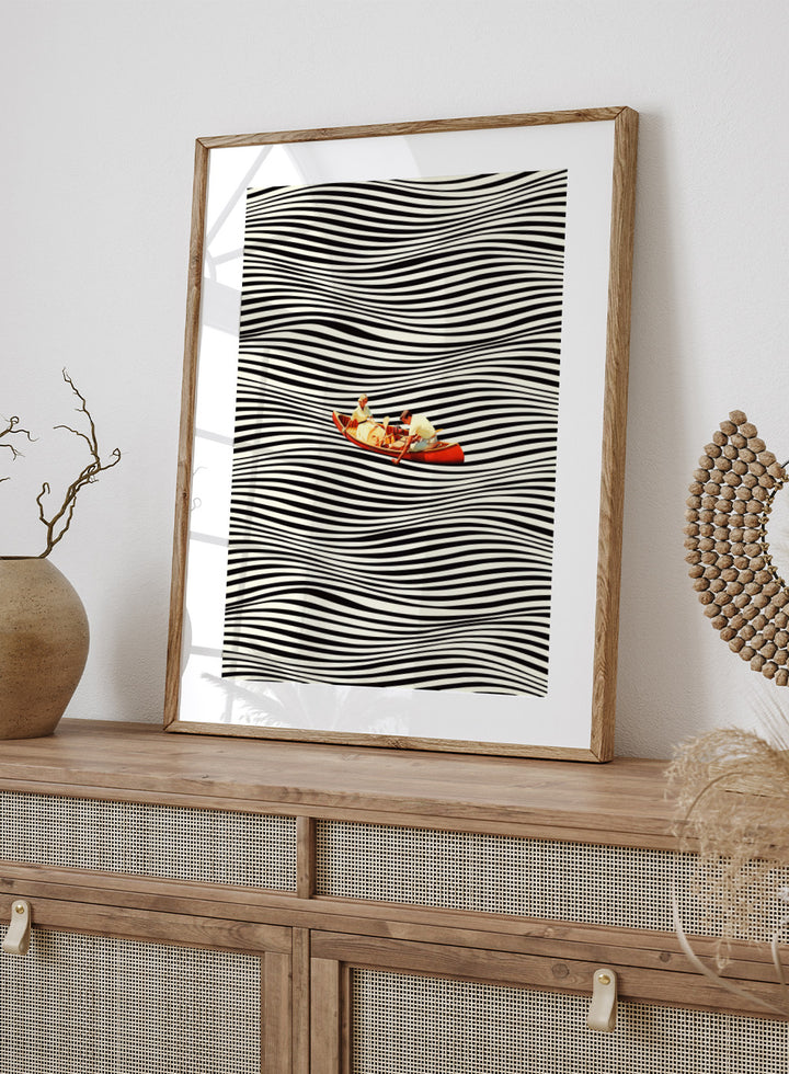 Two people in a red boat on a background of black and white wavy lines. The Real Boat Trip by Taudalpoi features a surreal boat illustration floating on black and white wavy lines. Retro collage art print with optical illusion design and optional framing.