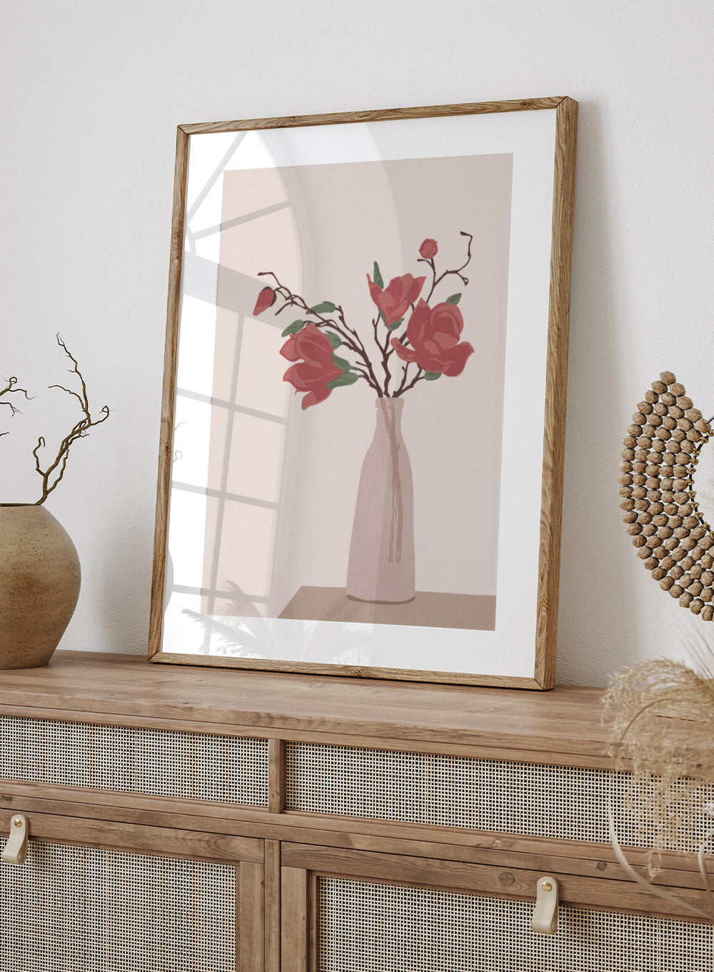Vase with red flowers on a beige background. Vase by Flow Line is a modern still life art print featuring soft pink flowers in a ceramic vase. A warm, minimal wall poster from the It’s All Love collection.