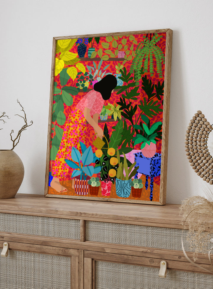 Colorful illustration of a person tending to plants with a vibrant background. Watering My Plants by Rafaela Mascaro fine art print featuring bold botanical interior, modern woman illustration, and colorful contemporary wall art poster.