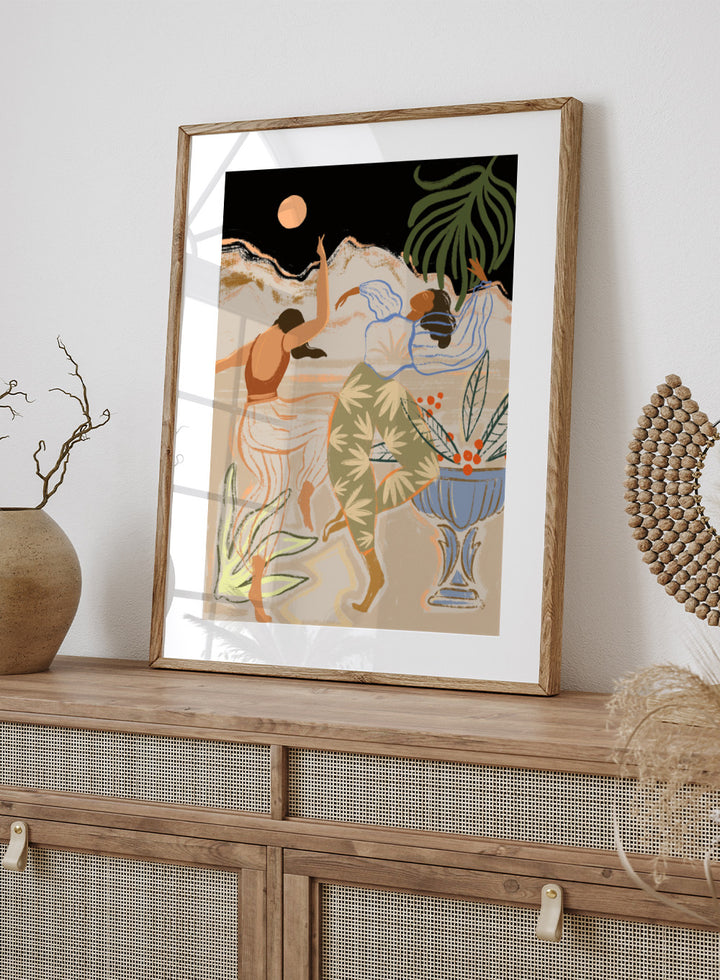Artistic depiction of two figures dancing with plants and a vase in the background. Moonlight Dance by Arty Guava is a modern illustration art print featuring dancing women, moon imagery, floral elements, and contemporary wall art design.