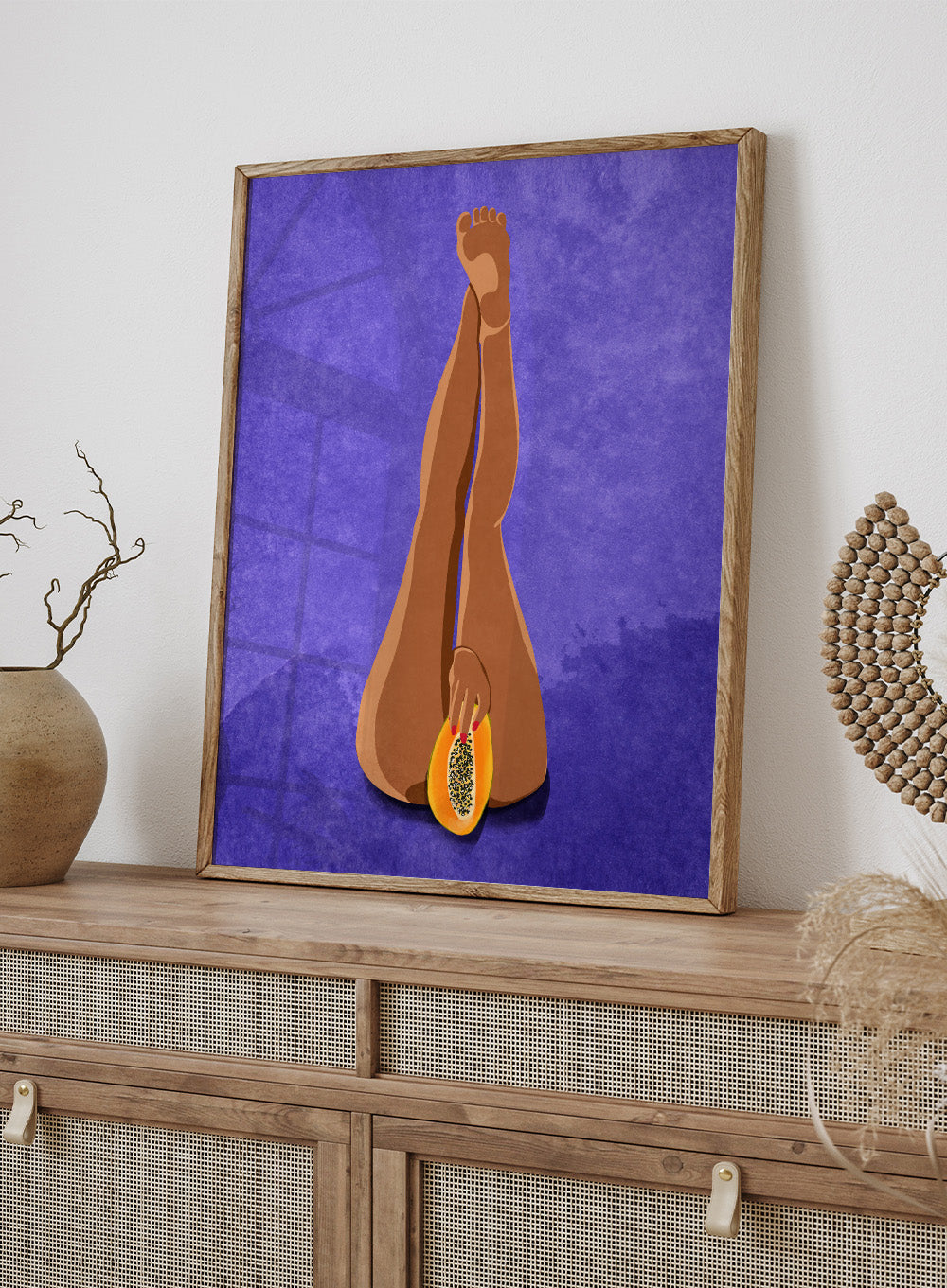 My Papaya by Raissa Oltmanns is a modern woman body art print featuring a bold papaya fruit illustration, playful legs portrait design, and statement wall poster.