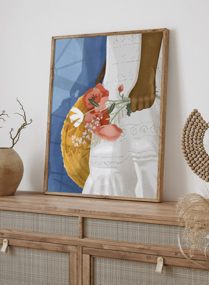Close-up of a person holding a floral arrangement with a blue background. Feeling Blue by Goed Blauw is a figure art print and wall poster featuring a woman holding flowers with a deep blue background and soft tones.