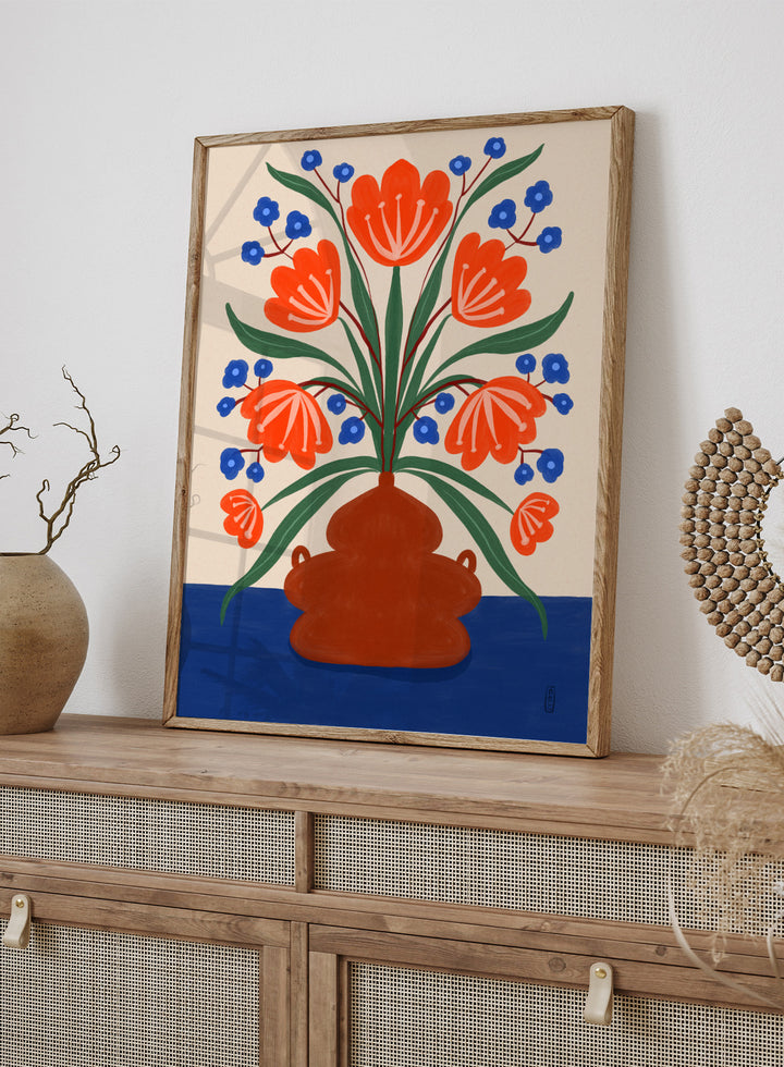 Vibrant Floral Terracotta Vase by Dirkie Nell is a colorful floral art print featuring bold orange flowers, folk inspired illustration, Mediterranean decor, and modern botanical wall art.