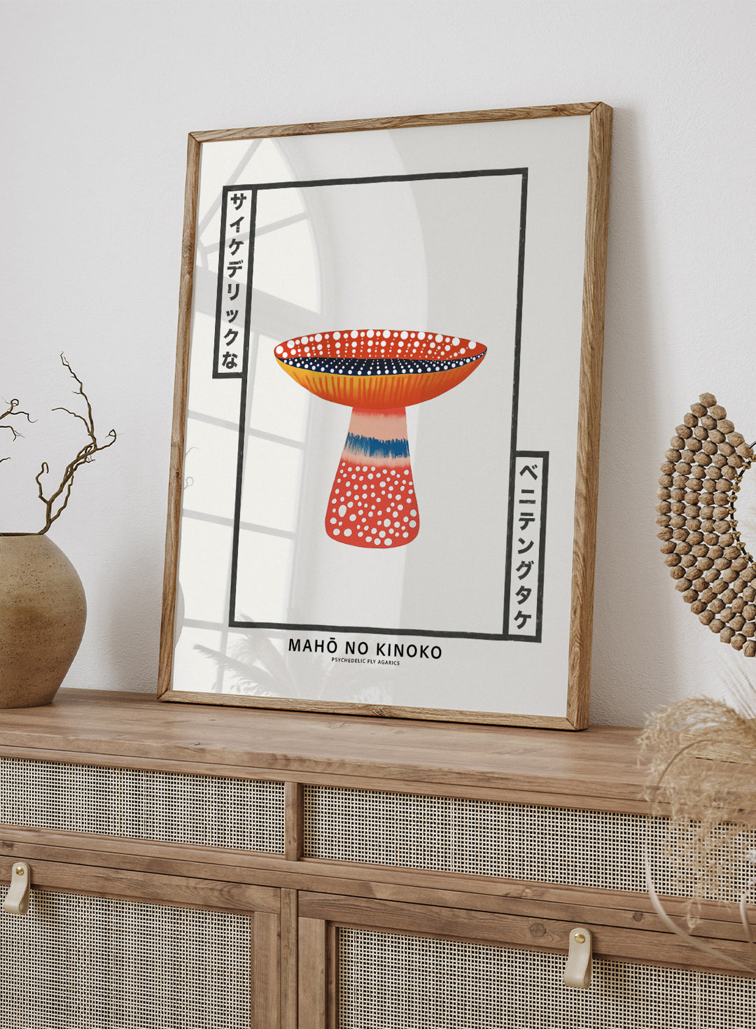 Decorative mushroom with polka dot patterns on a white background, featuring the brand 'MAHÔ NO KINOKO'. Mahō no Kinoko psychedelic fly agaric mushroom art print with Japanese typography, modern botanical poster and colorful mushroom wall art.