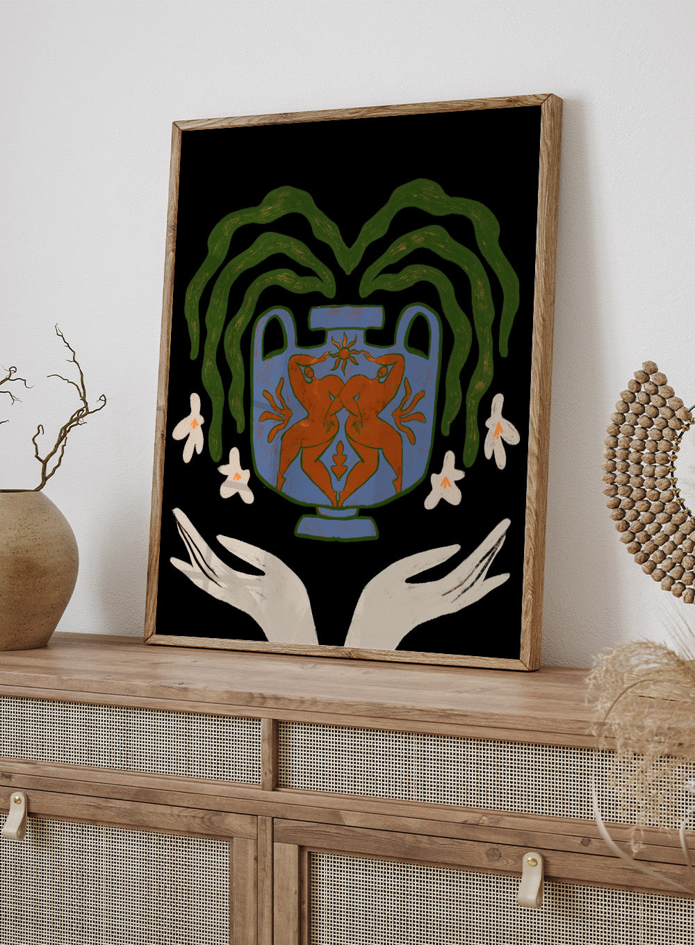 Decorative design with a blue urn, red figure, green leaves, and white flowers on a black background. Vessel Collection: Harmony by Arty Guava art print, modern vase wall poster with botanical illustration, contemporary minimalist line artwork.