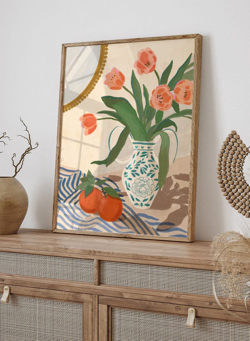 Fresh Tulips and Oranges by Katarzyna Gąsiorowska botanical still life art print with coral flowers, citrus fruit, and a patterned ceramic vase.