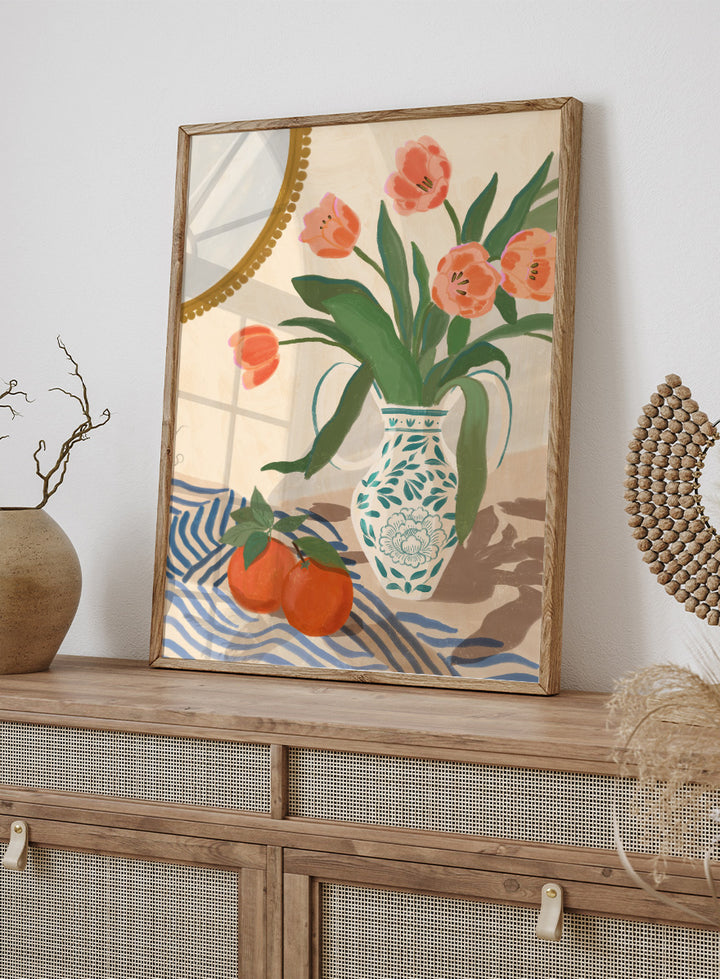 Fresh Tulips and Oranges by Katarzyna Gąsiorowska botanical still life art print with coral flowers, citrus fruit, and a patterned ceramic vase.