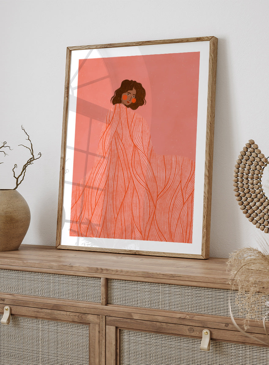 An art print featuring an illustration of a woman with dark curly hair wrapped in a flowing coral-orange patterned dress against a solid pink background. Coral Woman Dreaming by Bea Müller portrait art print featuring a woman wrapped in a flowing coral dress with fine red lines and modern graphic detail.
