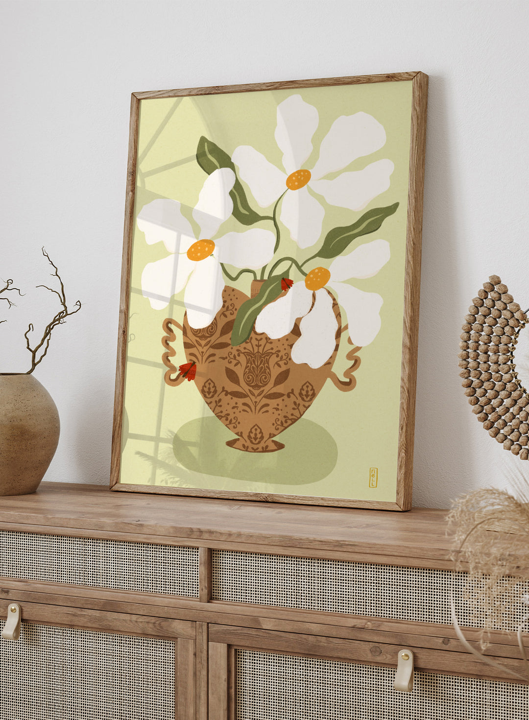 Decorative illustration of a vase with white flowers on a light green background. Whimsical Floral Heart by Dirkie Nell is a floral art print featuring oversized white flowers, a patterned heart vase, and hand painted folk inspired details.