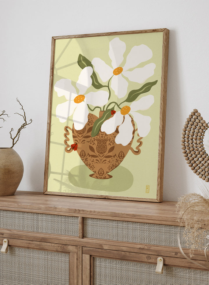 Decorative illustration of a vase with white flowers on a light green background. Whimsical Floral Heart by Dirkie Nell is a floral art print featuring oversized white flowers, a patterned heart vase, and hand painted folk inspired details.