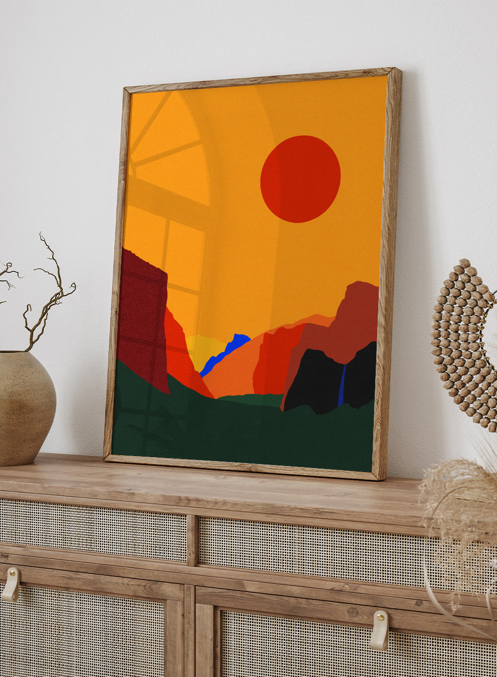 Simplified landscape with red sun, green ground, and brown cliffs. Yosemite Valley by Rosi Feist is a modern minimalist landscape fine art print featuring bold cliffs and a graphic sun. Officially licensed wall poster with optional artisan framing.