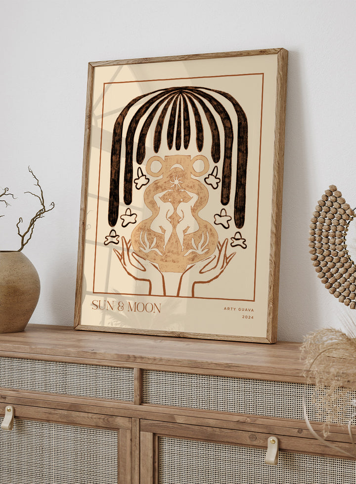 Artistic illustration of hands holding a symbol with 'Sun & Moon' text on a beige background. Vessel Collection: Sun & Moon by Arty Guava art print, modern vase wall poster with moon symbolism, contemporary minimalist line artwork.