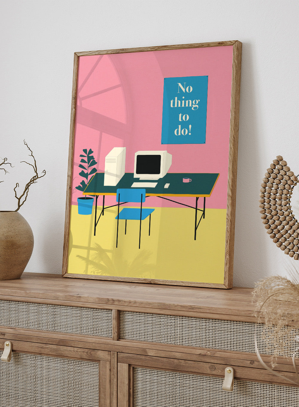 Illustration of a retro computer setup with 'No thing to do!' text on a pink wall. Nothing To Do by Rosi Feist is a modern minimalist desk art print with Bauhaus-inspired design and bold text. Officially licensed fine art poster with framing.