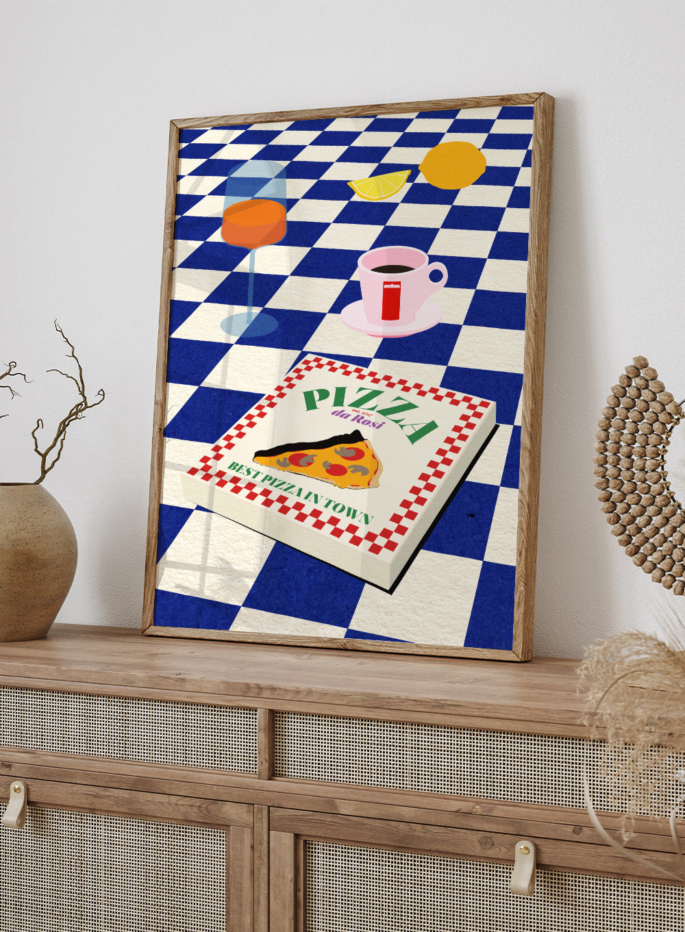 Pizza box with 'Pizza da Ross' branding on a blue and white checkered background. The Italian Menu by Rosi Feist is a modern kitchen wall art print featuring pizza and espresso in a bold minimalist food poster style.