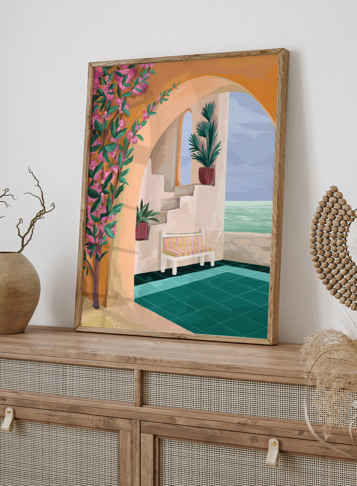 Decorative interior scene with an arch, bench, and ocean view. Bench with a View by Goed Blauw is a coastal art print and wall poster featuring an arched terrace, striped bench, and ocean view with warm tones.