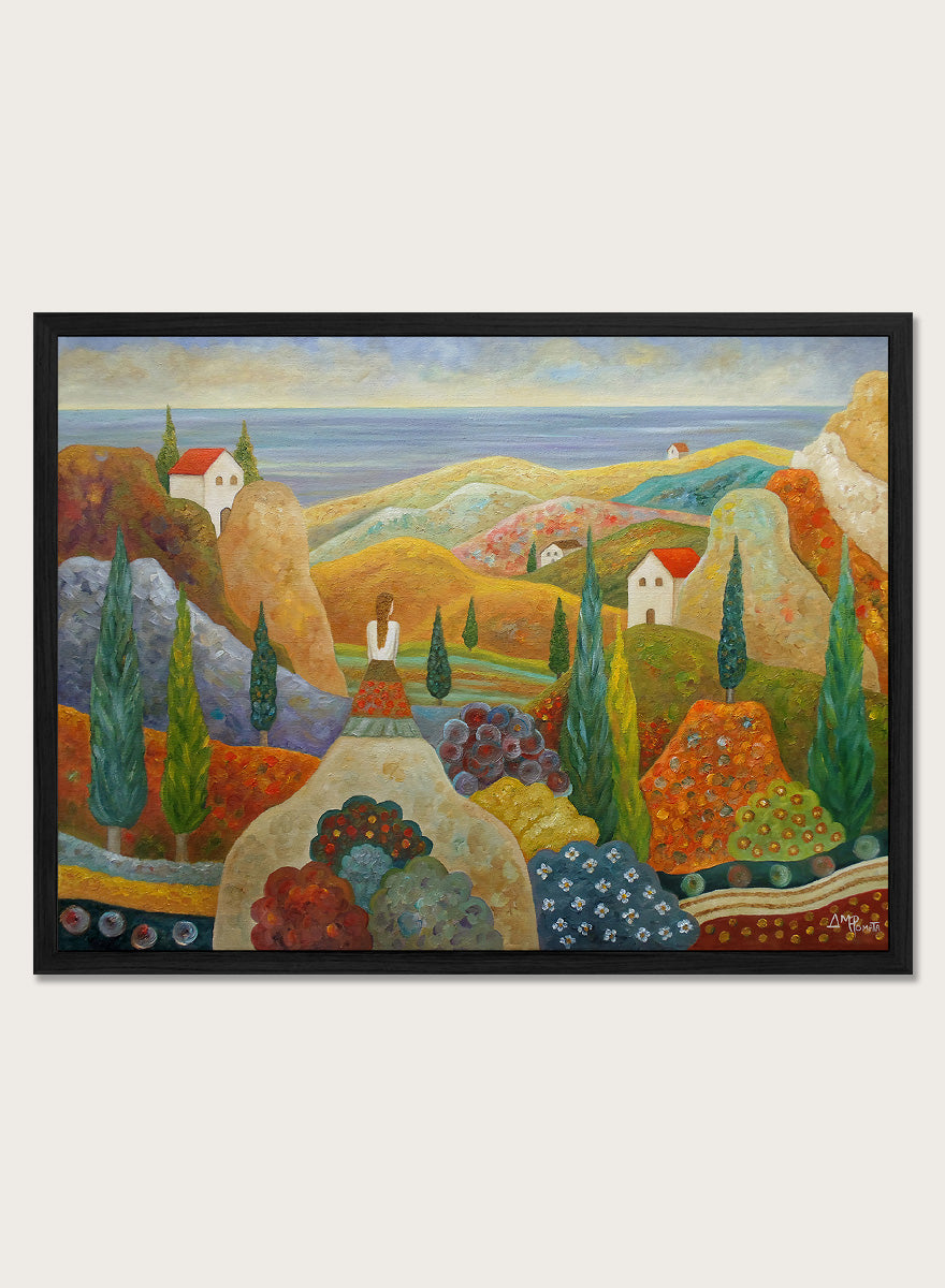 A framed landscape painting featuring stylized hills, cypress trees, small houses with red roofs, and a blue sea under a pale sky. Shop Woman in Mediterranean Landscape by Angeles M. Pomata, a colorful Mediterranean landscape and figurative art print with cypress trees, white houses, hills, and sea views.