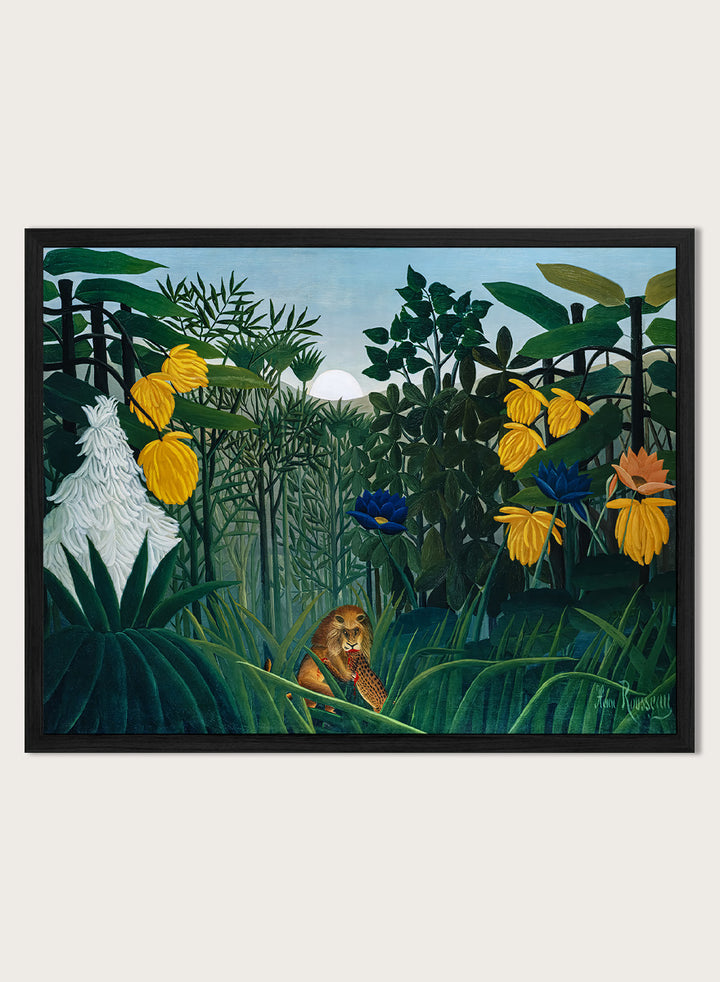 A framed art print depicting a lush jungle scene with green foliage, yellow flowers, blue and orange blossoms, and a small lion near the bottom center. The Repast of the Lion by Henri Rousseau is a vintage jungle art print featuring a lion hidden among dense tropical foliage and lush green plants.