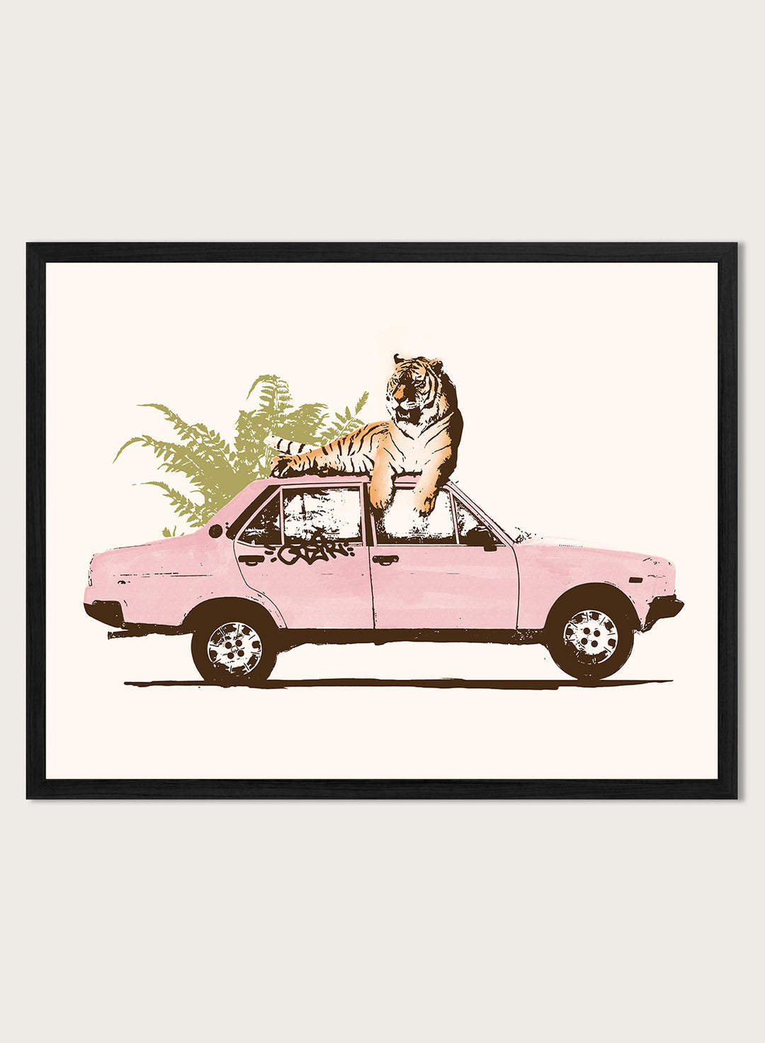 Framed artwork of a tiger in a pink car with greenery on a white background. Tiger On Pink Car by Florent Bodart is a surreal animal art print with a tiger on a vintage car, a modern wall poster with playful, bold, and imaginative design.