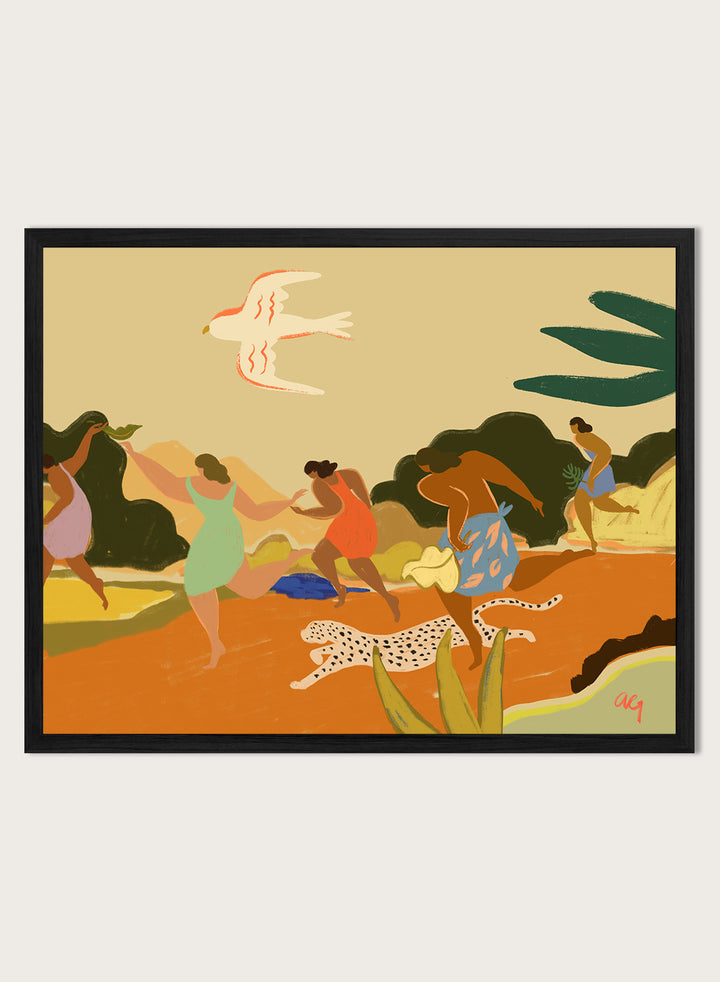 A framed art print featuring a stylized illustration of figures dancing and playing outdoors, with a bird, palm leaves, and a spotted cat. Run by Arty Guava premium framed fine art print featuring women racing through a tropical landscape beside a spotted leopard in warm, playful colors.