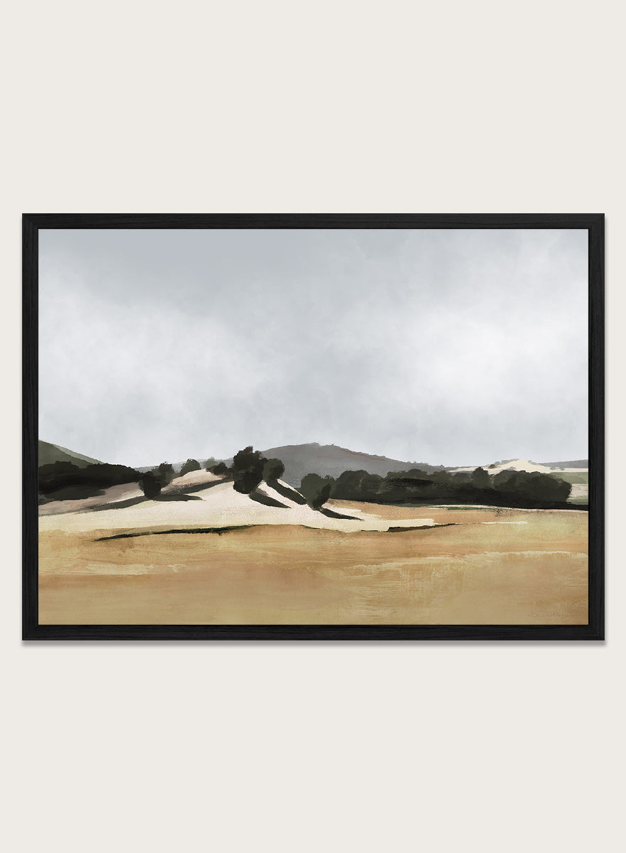 Shop Lazy Afternoon by Dan Hobday, a warm landscape art print featuring golden fields, dark trees, rolling hills, and soft late-summer tones.