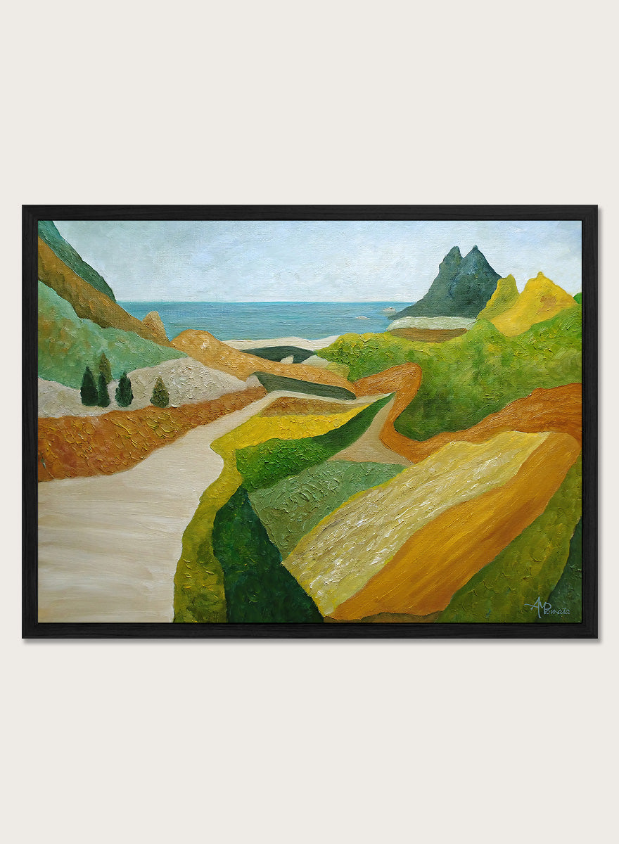 A framed landscape painting featuring a winding cream-colored path through green and ochre hills, leading to a blue sea and distant mountain under a pale sky. Shop Vibrant Coastal Vista by Angeles M. Pomata, a colorful coastal landscape art print featuring winding roads, rolling fields, rugged hills, and blue sea views.