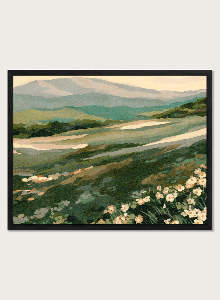 Shop Wildflower Mountain Landscape by Nikita Jariwala, a mountain wall art print with rolling green hills, cream wildflowers, and soft sage and blue-gray tones.