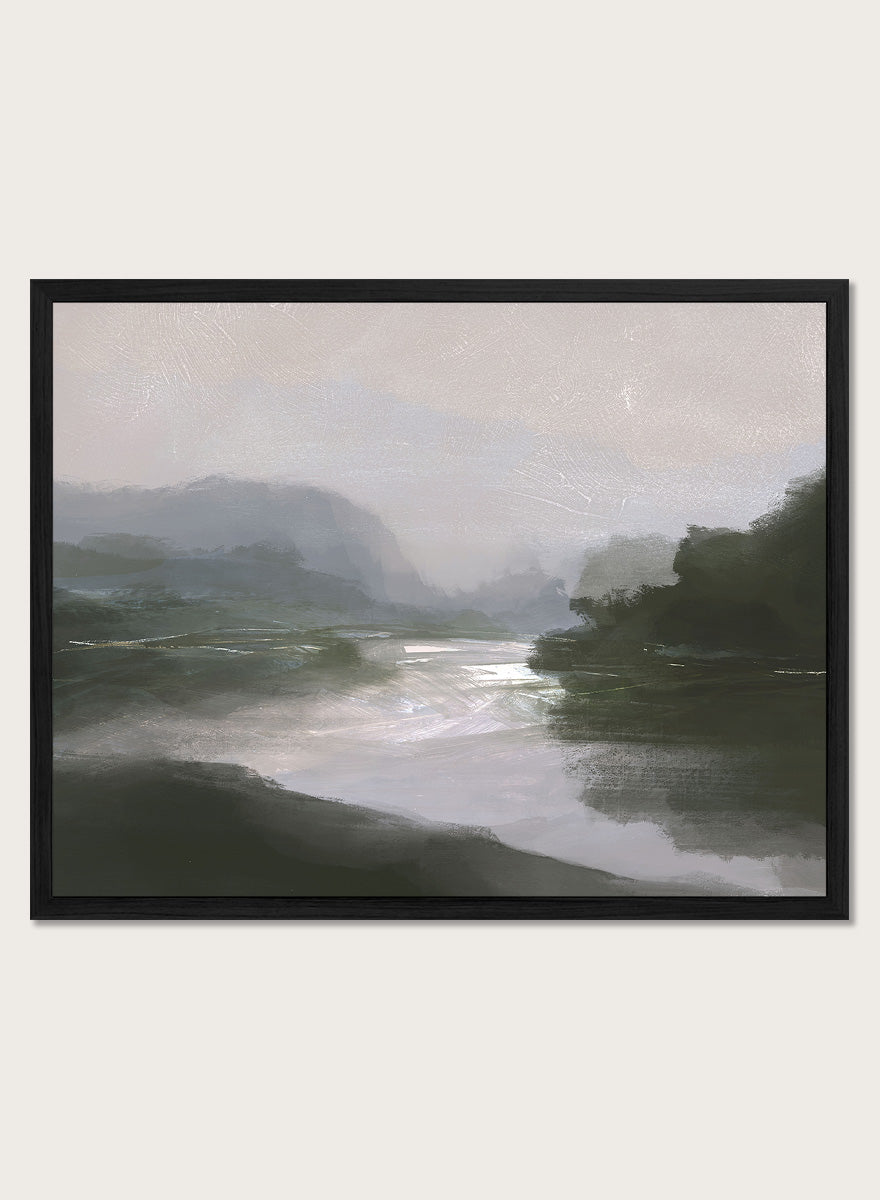 A framed landscape art print depicting a misty river scene with dark green hills, a reflective river, and a pale gray sky. Shop Tranquillitas by Dan Hobday, a contemporary landscape wall art print featuring reflective water, distant hills, dark green trees, and soft gray tones.