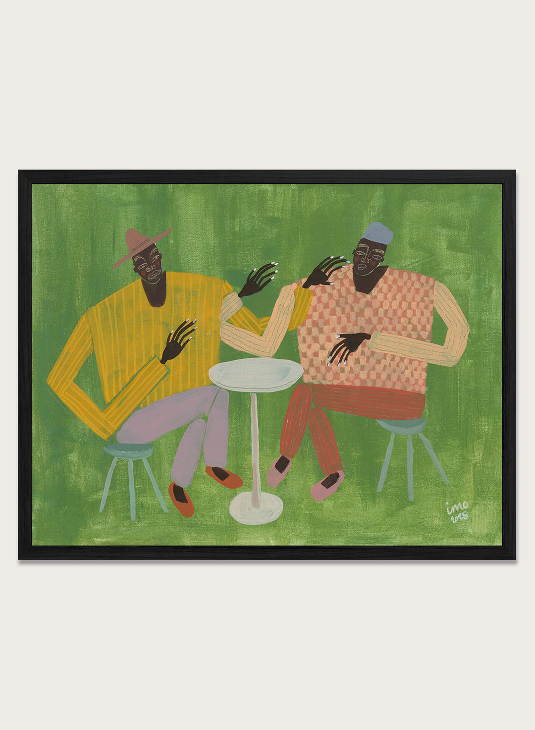 Framed artwork of two people sitting at a table on a green background. In Good Company by Studio IMO (Ibi Meier-Oruitemeka) is a modern figurative art print featuring two figures at a table in a bold contemporary wall poster design.
