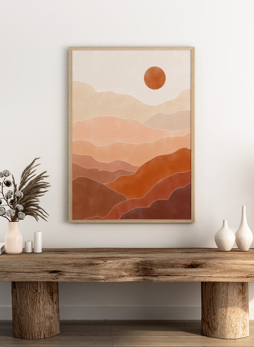 Shop Warm Desert Layers by Elena Ristova, a modern desert wall art print poster featuring layered hills, a terracotta sun, and warm peach, rust, and brown tones.