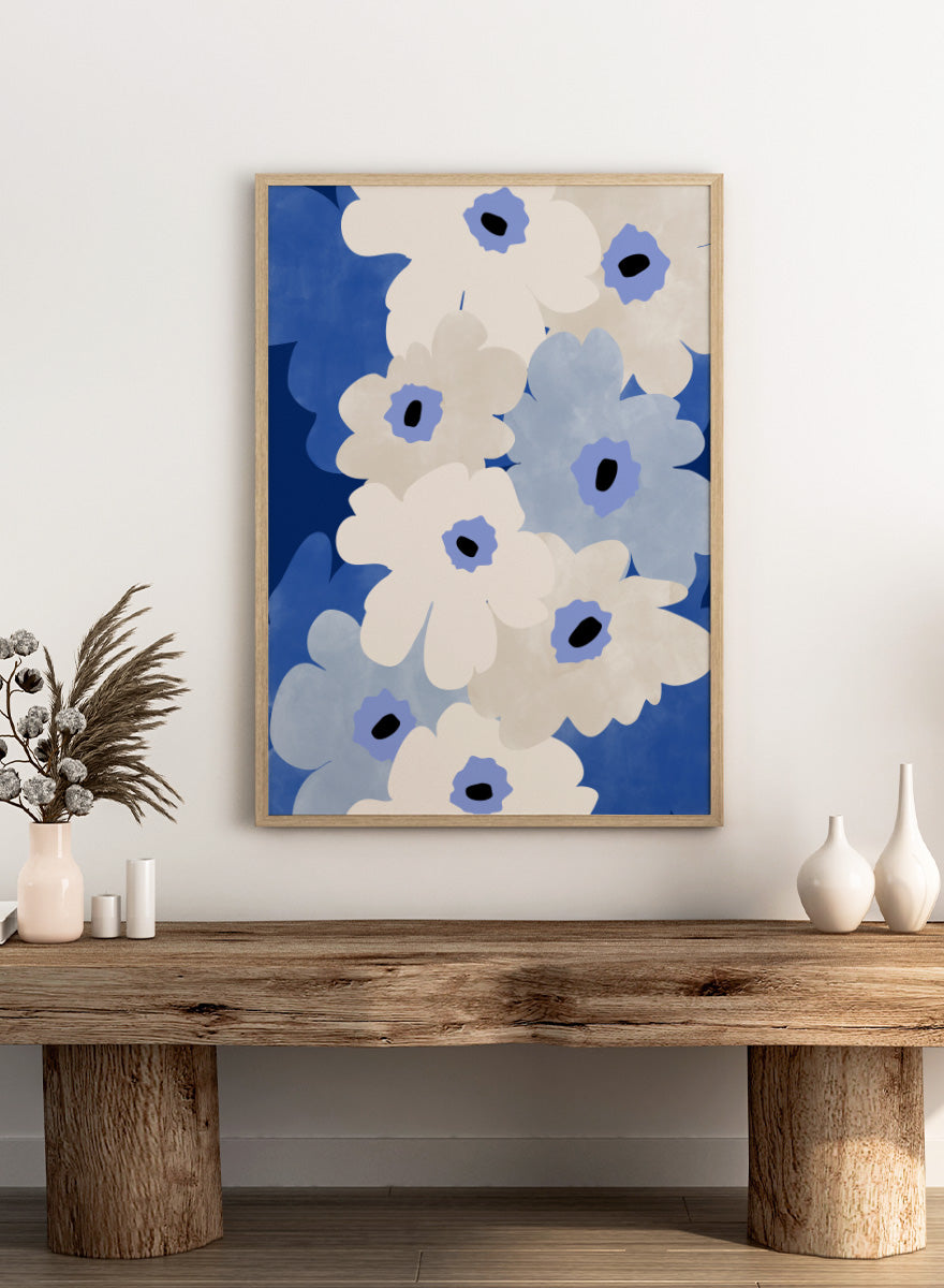 Shop White and Blue Flowers by Elena Ristova, a modern floral wall art print poster featuring oversized cream and blue blooms with bold cobalt and black details.
