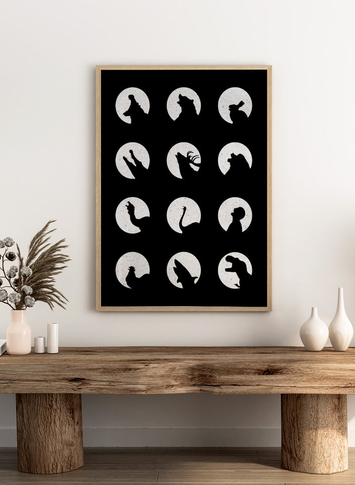 White silhouette of a dog howling at the moon pattern on a black background. Moonlit Wild Silhouettes by Florent Bodart is a minimalist animal silhouette art print with moon phases, a modern black wall poster with bold graphic design.