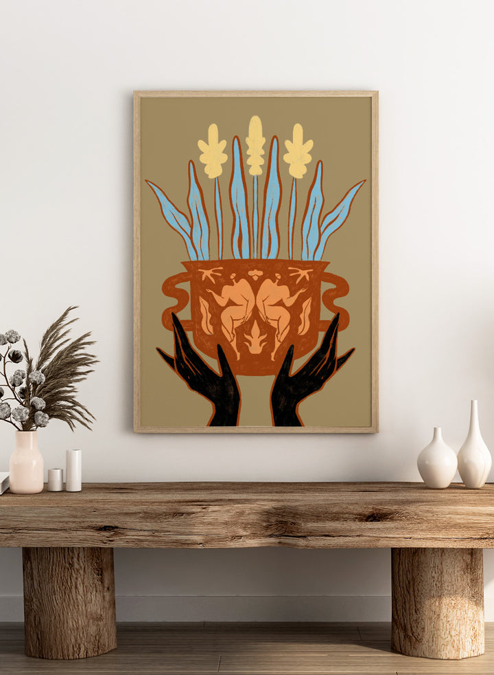 Decorative illustration of a vase with floral design and hands holding it, on a beige background. Vessel Collection: Growth by Arty Guava art print, modern vase wall poster with botanical illustration, contemporary minimalist line artwork.