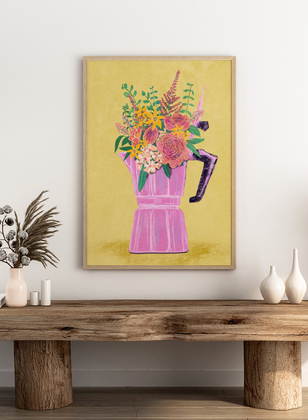 Colorful floral arrangement in a pink vase on a yellow background. Espresso Maker with Flowers by Raissa Oltmanns is a modern floral fine art print featuring a pink moka pot vase still life and bold kitchen wall decor poster.