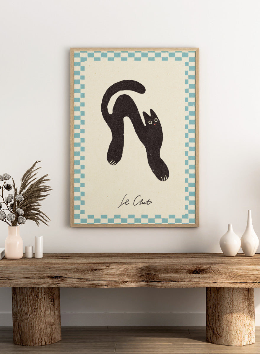 Shop Le Chat No.02 by NKTN, a playful black cat wall art print poster featuring a stretched cat, checkerboard border, and quirky vintage-inspired style.