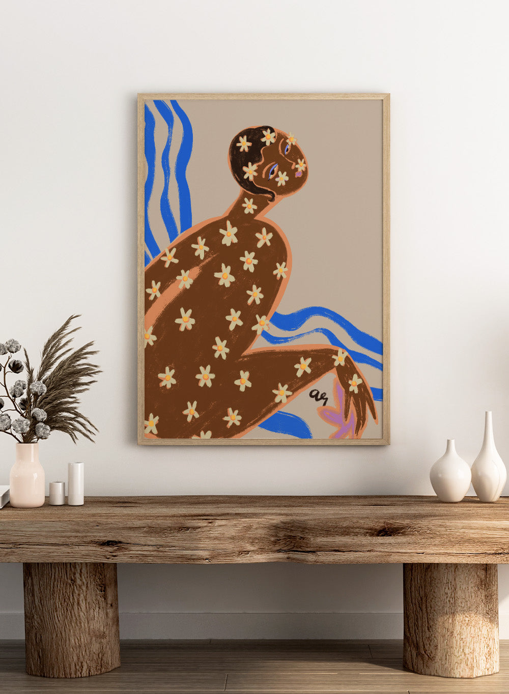 Artistic illustration of a person with floral patterns on a beige background. Blooming Daisy by Arty Guava is a modern woman floral art print with daisies and bold blue lines. Officially licensed contemporary wall poster.