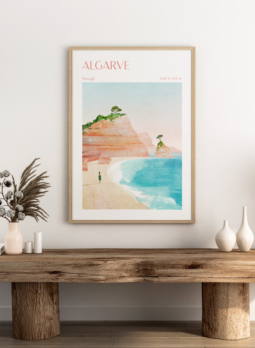 Illustration of a beach scene with cliffs and a person standing on the shore, labeled 'Algarve, Portugal'. Algarve Coastal Walk by Longwayhome is a minimalist coastal landscape art print featuring Portugal cliffs, turquoise ocean scenery, and modern travel inspired design.