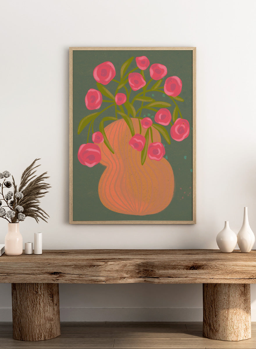 Shop Pink Flowers Orange Vase by Nikita Jariwala, a floral wall art print poster with bold pink blooms, an orange vase, olive stems, and deep green tones.