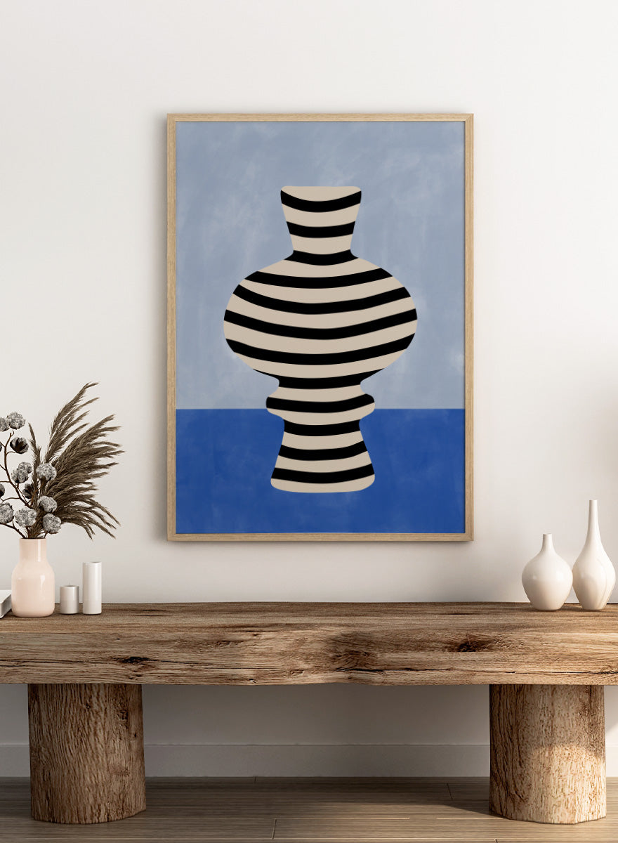 Shop Modern Striped Vase by Elena Ristova, a modern still life wall art print poster featuring a black-and-cream striped vase against soft blue tones.