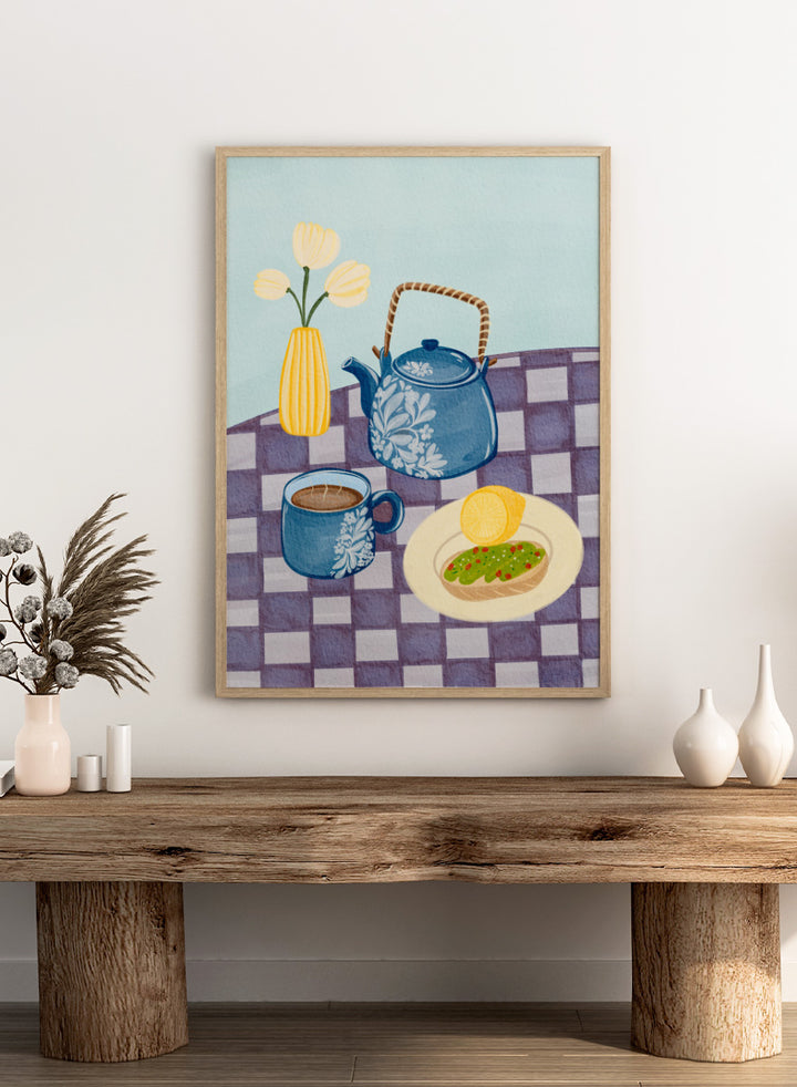 Shop Blue Teapot Breakfast by Nikita Jariwala, a kitchen wall art print poster featuring a floral teapot, tea cup, breakfast still life, and blue tones.
