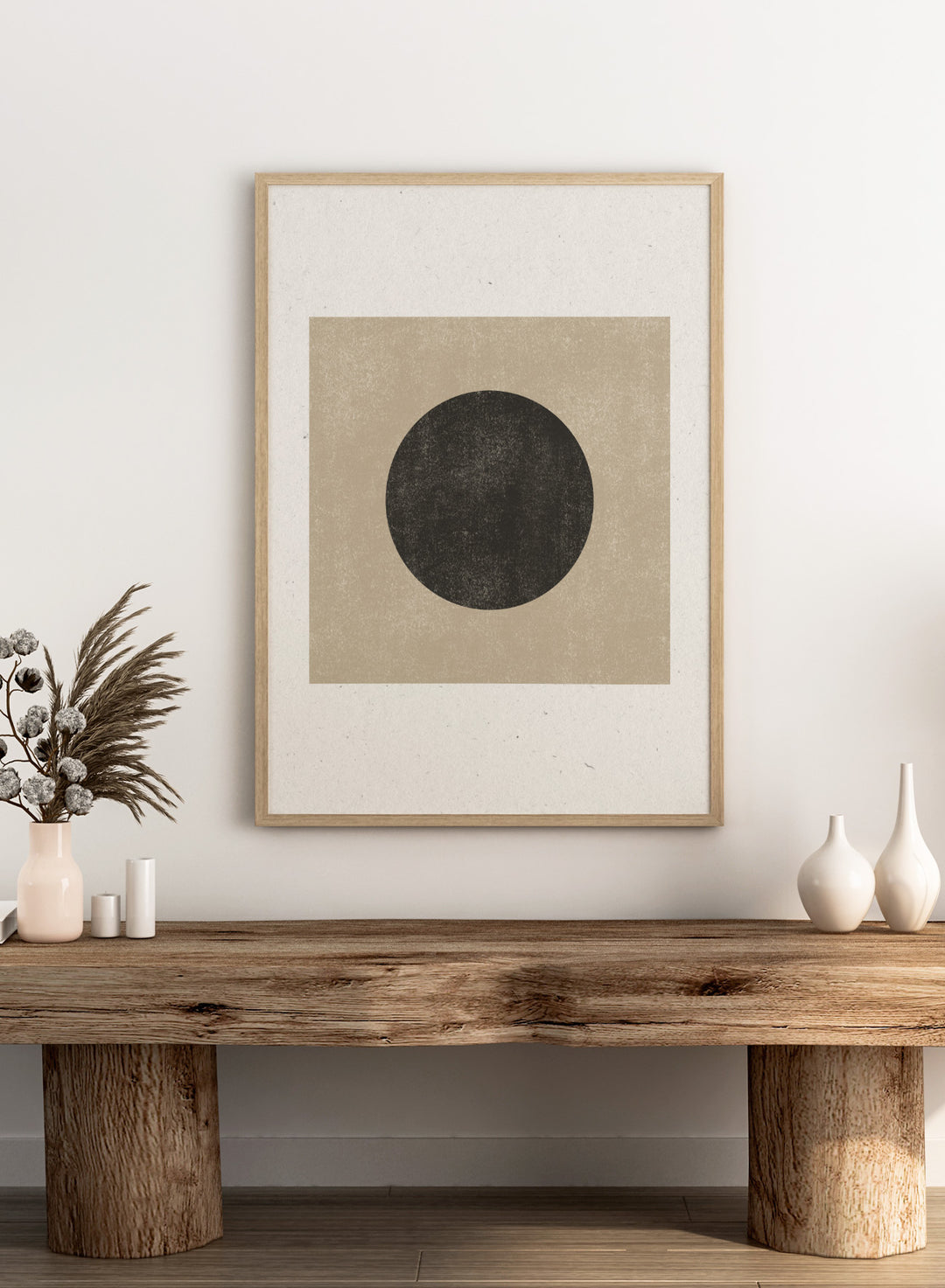 Black circle on beige background. Eclipse Silence by The MIUUS Studio is a minimalist abstract art print and wall poster featuring geometric shapes, neutral tones, and modern textured design.