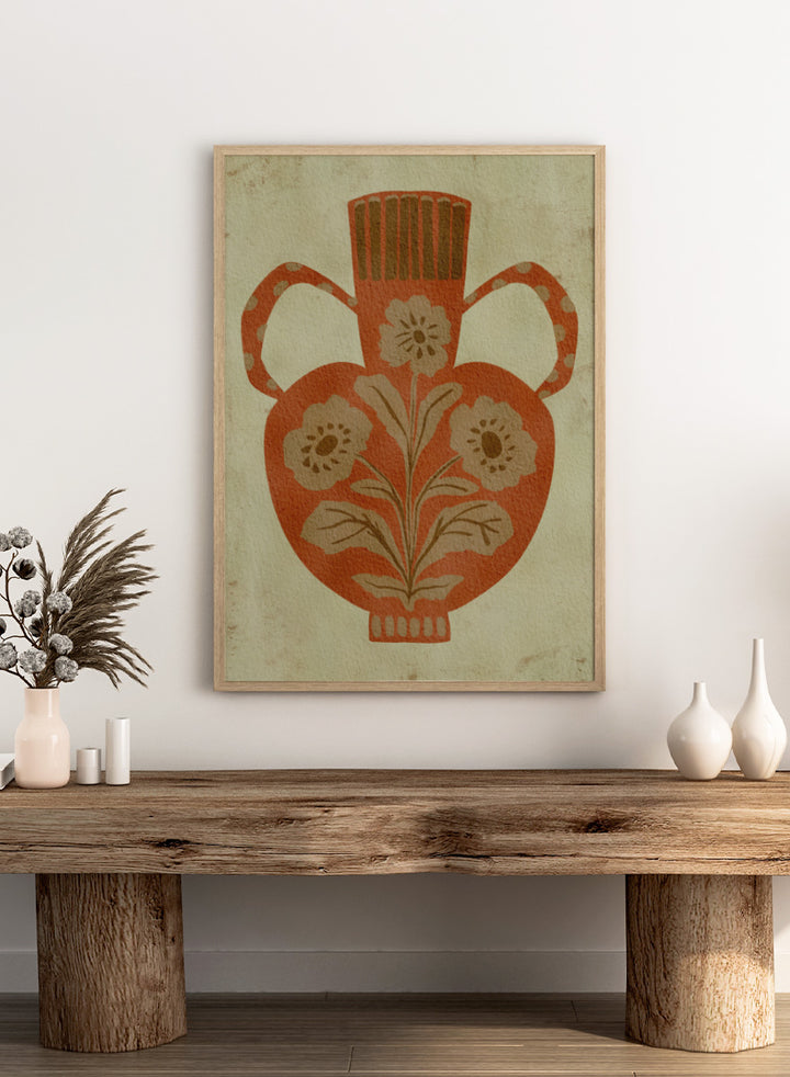 Shop Rustic Floral Vase by Nikita Jariwala, a botanical wall art print featuring a terracotta vase, folk-inspired flowers, and warm rust, tan, and cream tones.