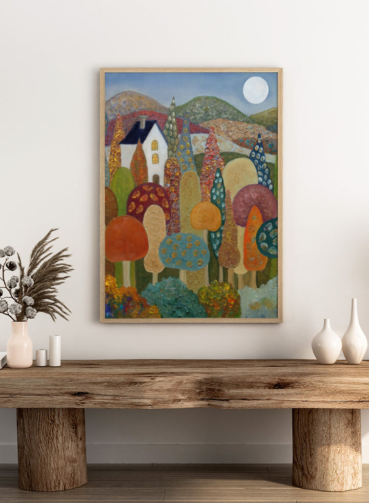 A colorful, textured folk-art style landscape painting featuring stylized mushrooms, a white house, rolling hills, and a full moon. Shop Whimsical Moonlit Landscape by Angeles M. Pomata, a colorful autumn landscape art print featuring a white house, full moon, rolling hills, and stylized trees.