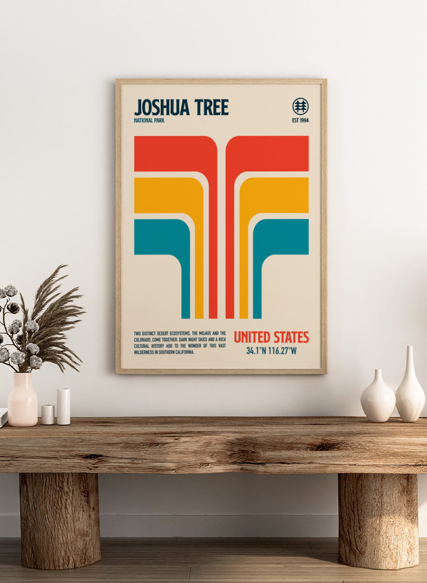 A retro-style poster for Joshua Tree National Park with bold geometric shapes in red, orange, yellow, and teal on a cream background, plus text reading &