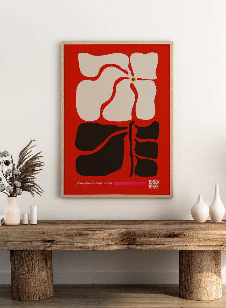 Abstract design with geometric shapes on a red background, featuring text at the bottom. English Gardens Red by Frances Collett features a bold illustrated flower with dark leaves on a red background. Officially licensed floral wall art print with optional framing.