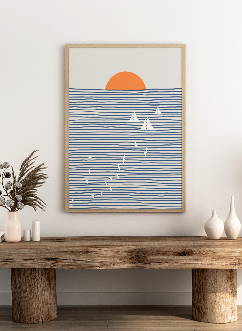 Three White Sails art print by Little Dean. Contemporary coastal wall art with sailboats, birds, striped ocean lines, orange sun, modern illustration poster design.