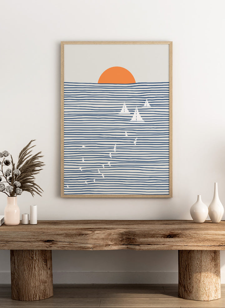 Three White Sails art print by Little Dean. Contemporary coastal wall art with sailboats, birds, striped ocean lines, orange sun, modern illustration poster design.